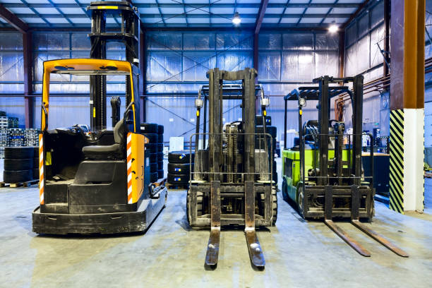 Forklifts in modern warehouse stock photo