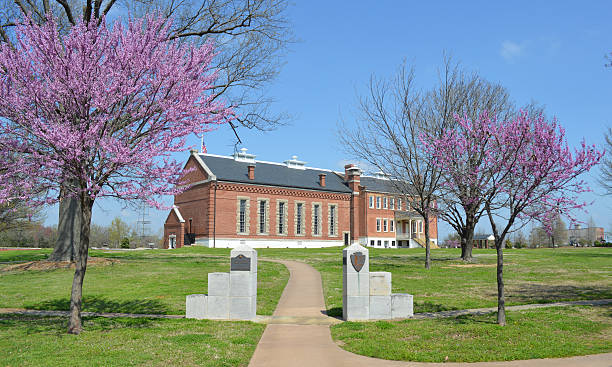 Fort Smith National Historic Site Gateway C The old barracks, courthouse, and jail at the Fort Smith National Historic Site at Fort Smith Arkansas. fort stock pictures, royalty-free photos & images