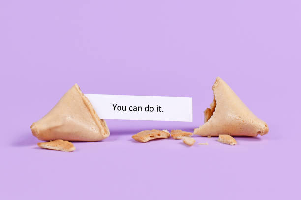 Fortune cookie with motivational text saying 'You can do it' stock photo