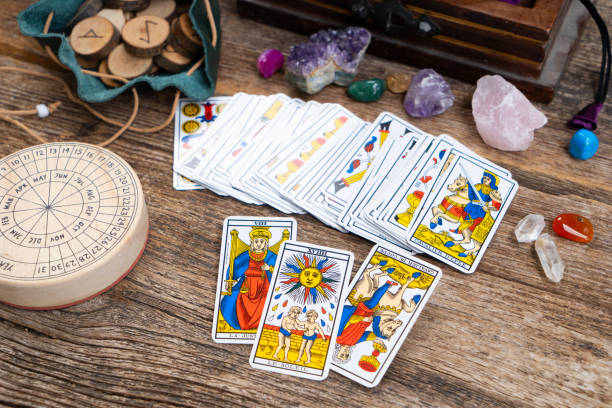 Fortune telling on tarot cards stock photo
