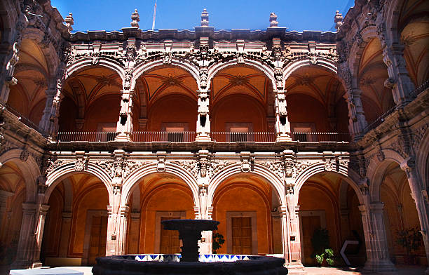 Fountain Courtyard Orange Arches Sculptures Queretaro Mexico stock photo