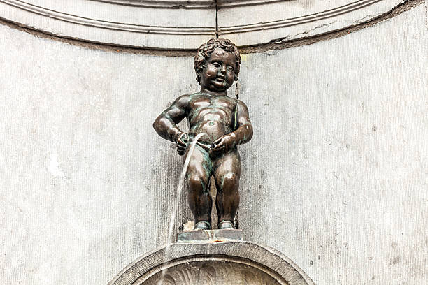 Fountain figure of Manneken Pis in Brussels stock photo
