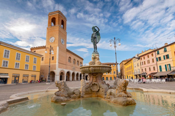 Fountain of Fortune and Palazzo del Podesta, Fano, Pesaro, Italy. stock photo