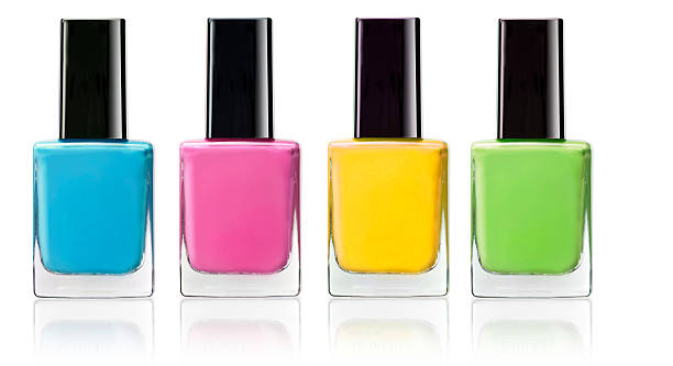 four colour of nail polish four colour of nail polish, azure, pink, yellow, green nail polish stock pictures, royalty-free photos & images