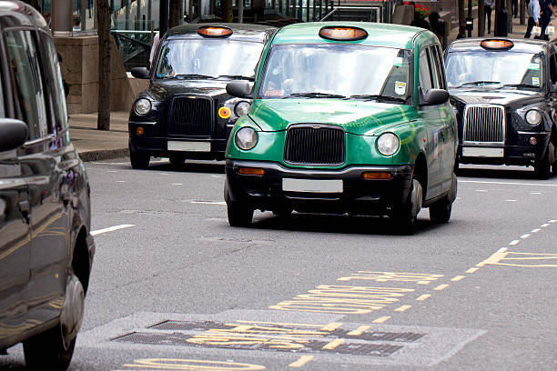 Four London Taxi Cabs stock photo