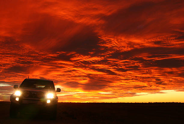 Four Wheel Drive at Sunset  cirrostratus stock pictures, royalty-free photos & images