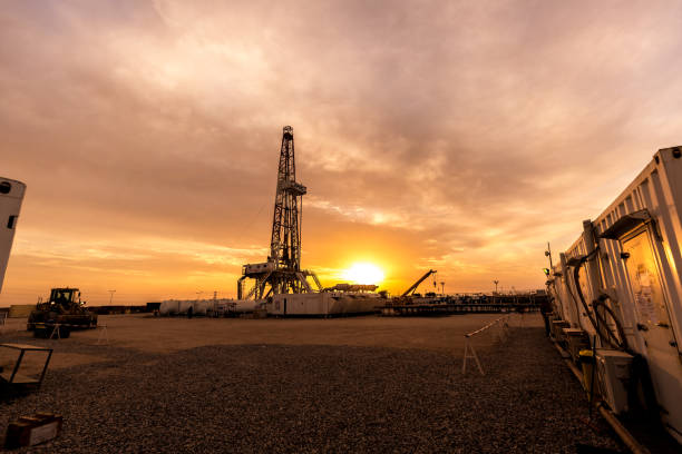Fracking Drill Rig at Sunset stock photo