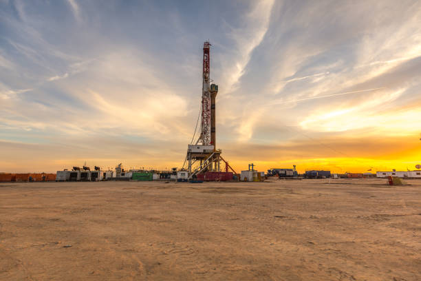 Fracking Drilling Rig at the Golden Hour stock photo