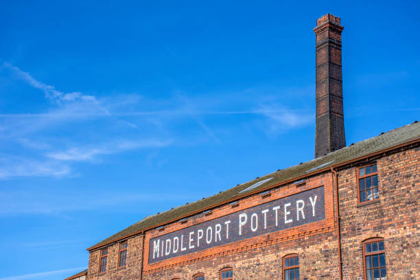 Fragment of Middleport pottery factory on bank of Trent and Mersey canal.19th century historic industrial architecture.Blue sky in background and copy space. stock photo