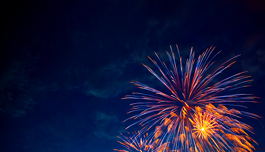 4th July fireworks. Fireworks display on dark sky background.