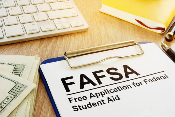 Free Application for Federal Student Aid (FAFSA) concept. Free Application for Federal Student Aid (FAFSA) concept. application form photos stock pictures, royalty-free photos & images