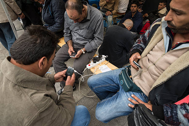 Free charge of mobil phones for refugees. stock photo