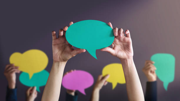 Freedom of Speech Concept. Group of People Protesting or making Campaign with a Blank Speech Bubble. Expression for the Human Rights stock photo