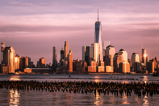 Freedom Tower and Lower Manhattan glowing from the setting sun