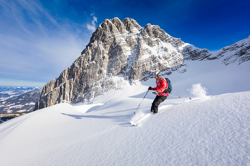 Freerider skier running downhill - Watzmann, Berchtesgaden National Park in Alps