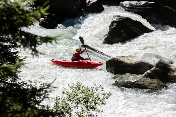 Freestyle kayaking in whitewater stock photo