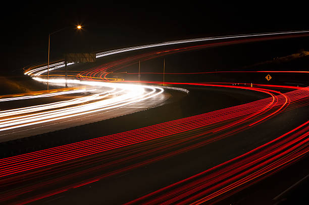 freeway lighttrails stock photo
