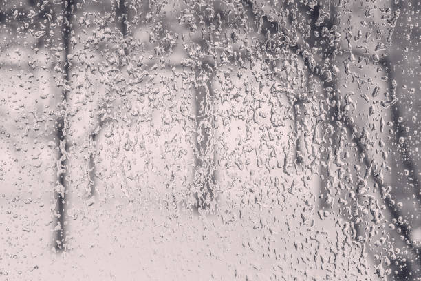 Freezing rain outside the window on a foul winter day stock photo
