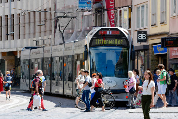 Freiburg im Breisgau, Salzstrasse with trams and passers-by stock photo