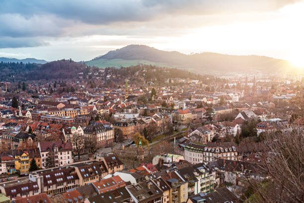 фрайбург панорама на закате - freiburg стоковые фото и изображения
