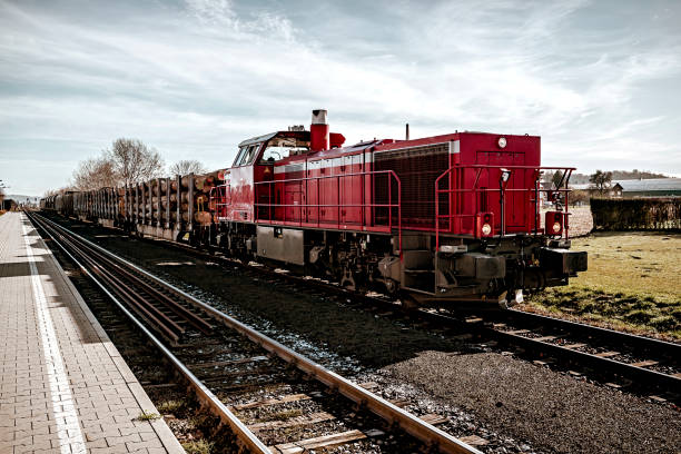 Freight train carrying wood stock photo
