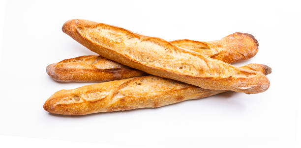 French baguette isolated on white background French baguette isolated on white background baguette photos stock pictures, royalty-free photos & images
