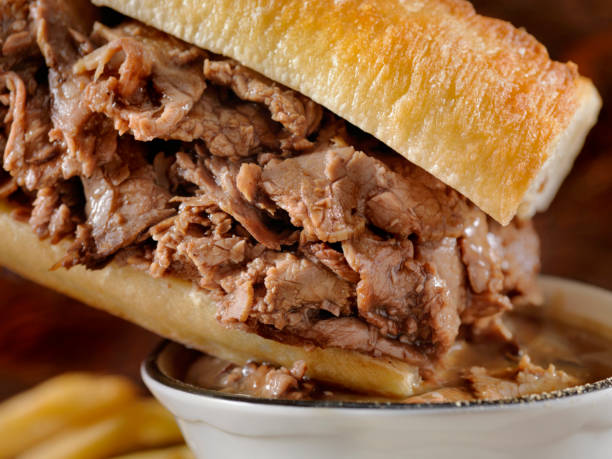 French Beef Dip  roast beef sandwich stock pictures, royalty-free photos & images