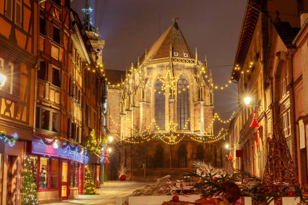 French city Colmar on Christmas Eve. Traditional old half-timbered houses in the historic city of Colmar. Decorated and lighted during the Christmas season. Alsace. France. colmar stock pictures, royalty-free photos & images