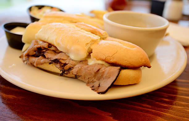 French Dip Sandwich French Dip or Beef Dip Sandwich roast beef sandwich stock pictures, royalty-free photos & images