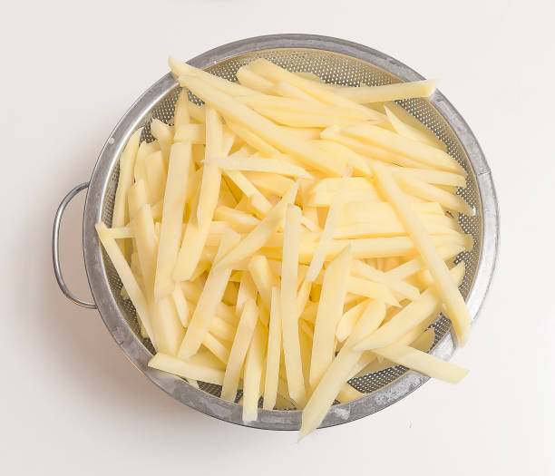 French fries, raw stock photo