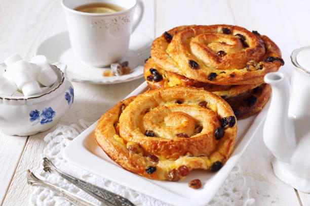 French raisin buns and tea stock photo