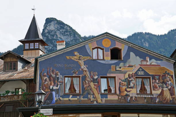 Frescoes painting at the pedestrian zone of Oberammergau. Bavaria, Germany. stock photo