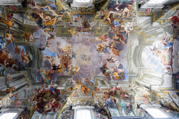 Frescos in church in Rome, Italy Paintings and frescos on the ceiling of a catholic church in Rome, Italy fresco stock pictures, royalty-free photos & images