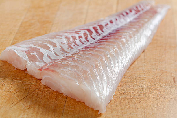 Fresh boneless skinless cod filet stock photo