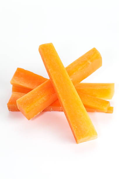Fresh carrot slice on a white background stock photo