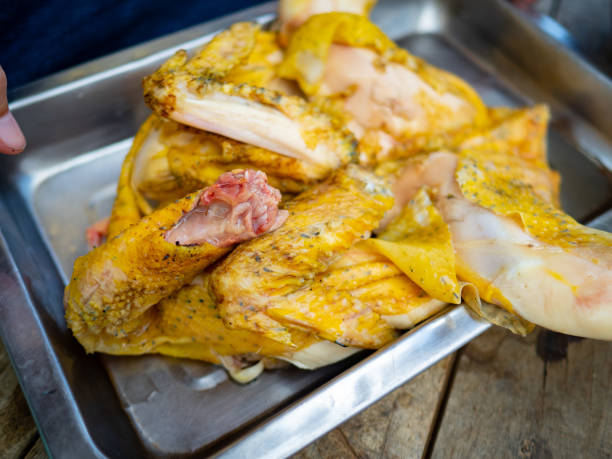 Fresh chicken that has been cut for use in food processing stock photo