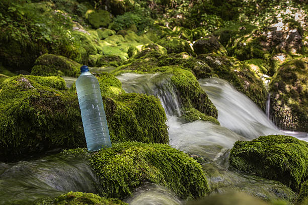 Fresh drinking water from mountain source stock photo