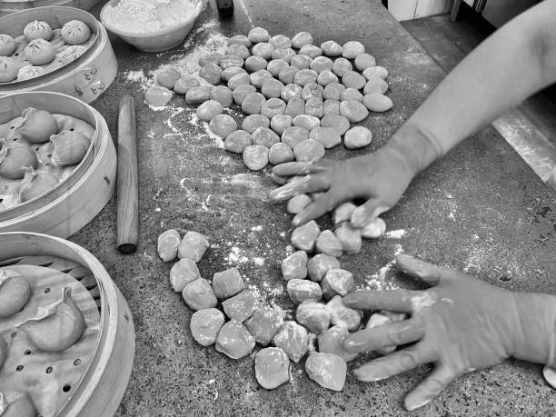 fresh handmade wontons at the mercato centrale firenze. ( black & white ) stock photo