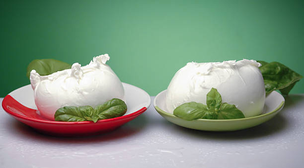 Fresh  italian mozzarella with basil leaves Fresh  italian  buffalo mozzarella buffalo shooting stock pictures, royalty-free photos & images
