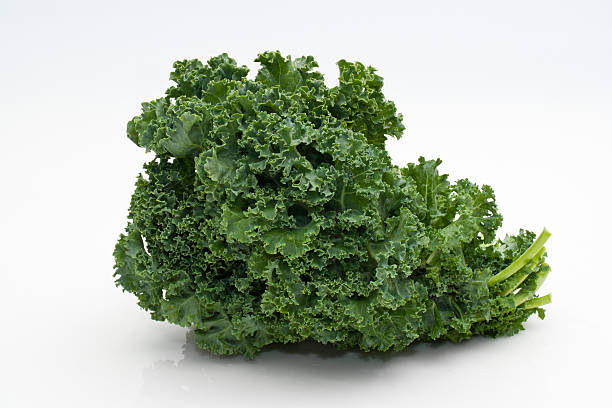 Fresh kale on white background stock photo