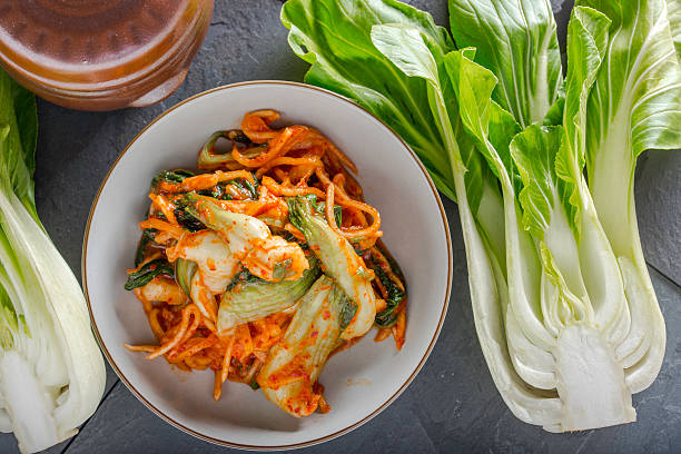 Fresh Kimchi Fresh Kimchi made of Bok Choy fermenting stock pictures, royalty-free photos & images