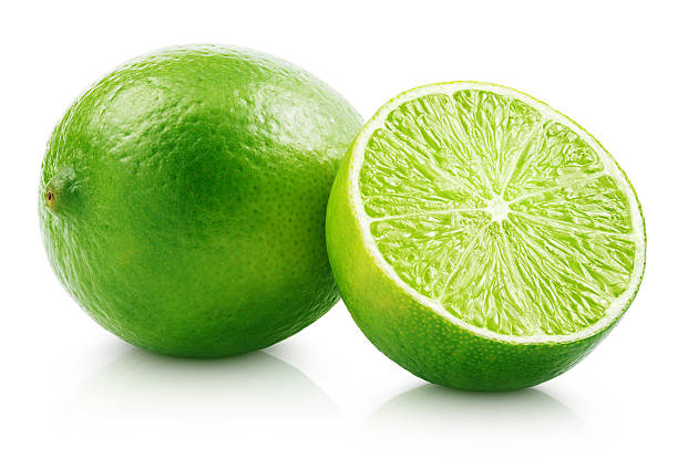 Fresh lime citrus fruit with slice stock photo