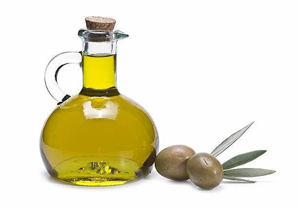 fresh olive oil in a bottle stock photo