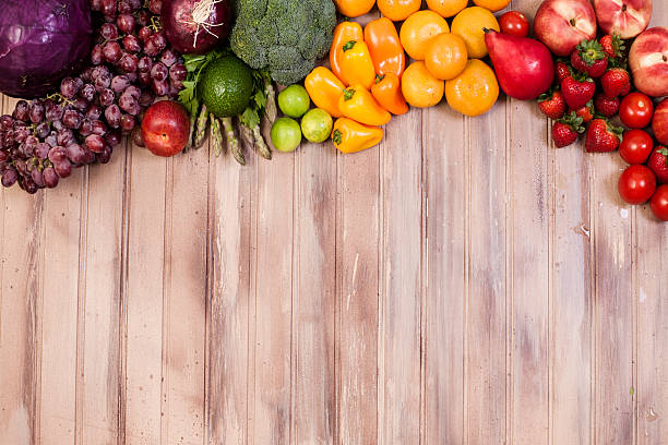 Fresh Organic Colorful Fruits Vegetables On Rustic Wooden Table Stock Photo