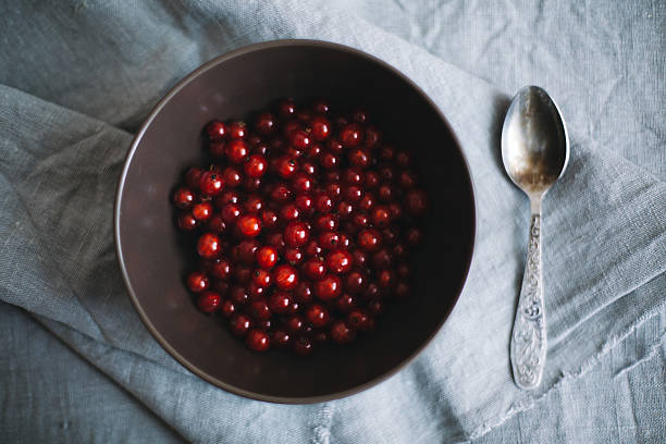 Fresh red currant in a bowl stock photo