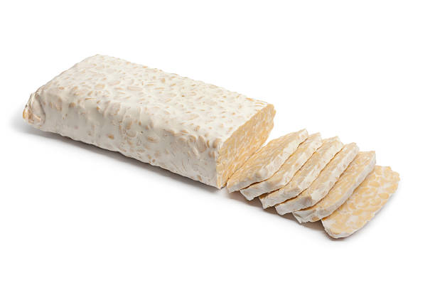 Fresh tempeh with slices stock photo