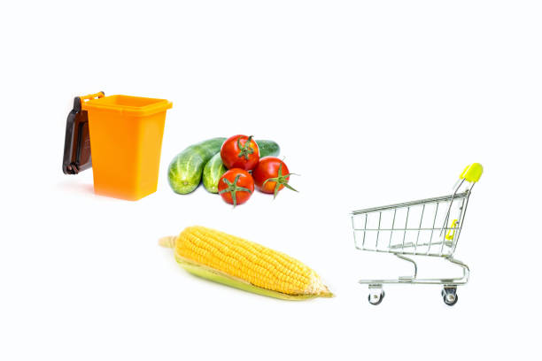 fresh vegetable end yellow bin isolated on white background, image for food zero waste concept. stock photo
