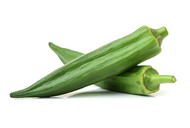 Fresh young okra Fresh young okra isolated on white background okra plants pics stock pictures, royalty-free photos & images