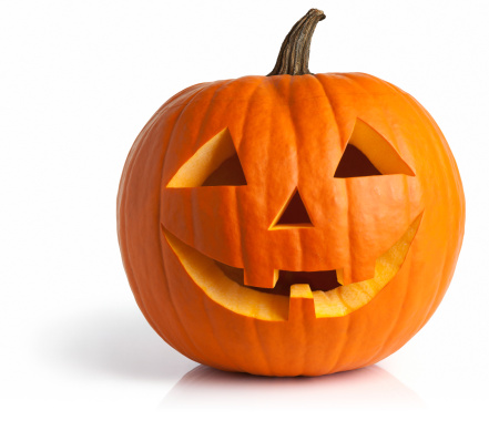 Jack-o-lantern isolated with shadow and reflection. Clipping path provided.