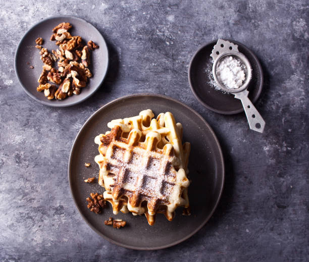 Freshly homemade baked waffles on the plate stock photo